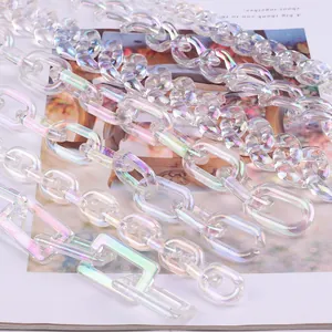Macro view of various acrylic iridescent chain links with holographic finish for DIY