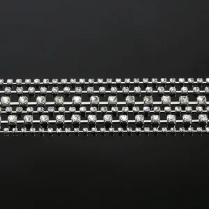 Close-up detail of silver rhinestone cup chains with clear glass crystals for DIY jewelry.