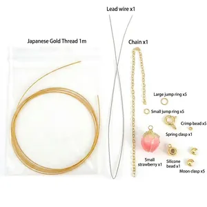 14K gold filled DIY jewelry accessory kit with strawberry charm and wire.