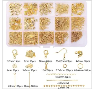 Gold jewelry findings kit detail showing assorted clasps, hooks, and jump rings