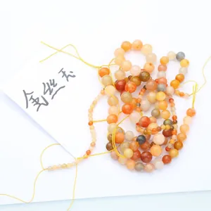 Natural red Golden Silk Jade round loose beads for high-quality handmade DIY jewelry.