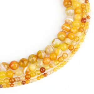Faceted yellow and orange natural stone agate beads for DIY jewelry making strands.