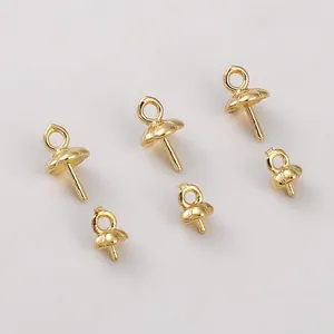 Vista de detalle de casquillos para perlas bañados en oro de 14K para hacer joyas