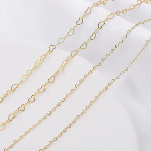 Close-up macro detail of four 14K gold filled heart-shaped chains for DIY jewelry making material
