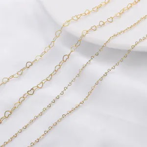 Macro view of 14K gold-filled heart shaped links chain for DIY necklace making