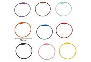 Macro view of 50mm colorful steel wire key rings in various candy colors for DIY crafts