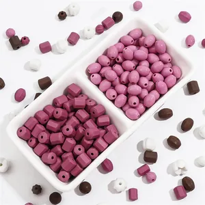 Mixed vintage kiln-fired ceramic beads in purple and brown for DIY jewelry making