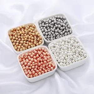 Selection of high-quality metallic round spacer beads in gold, silver, and rose gold