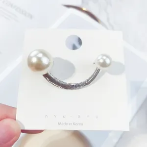 Elegant minimalist silver U-shaped alloy brooch featuring two white pearls for accessories