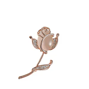 Elegant rose-gold flower brooch with cat-eye stone and sparkling rhinestones for women