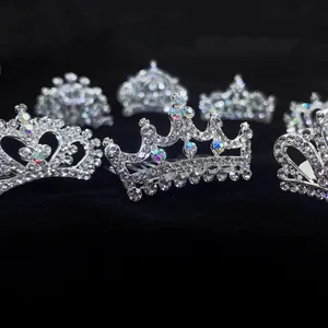 Macro view showing the sparkling rhinestones and intricate design of girls' tiara hair combs.