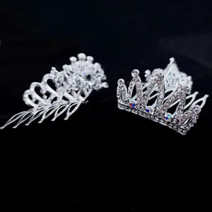 Detailed macro view showing two sparkling silver rhinestone tiara hair combs on black.
