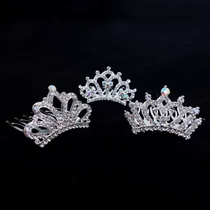Detailed view of three elegant silver rhinestone crown hair combs for girls' birthday party.