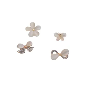 Elegant cat eye stone brooch set with butterfly flower bow designs for clothing accessories
