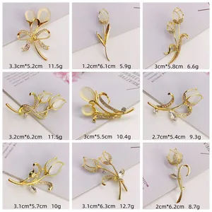 Multi-style tulip brooches with cat's eye stones and rhinestones, detailed dimensions.