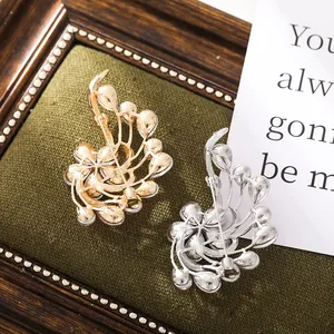 Macro detail of the back structure for elegant gold and silver brooch accessories