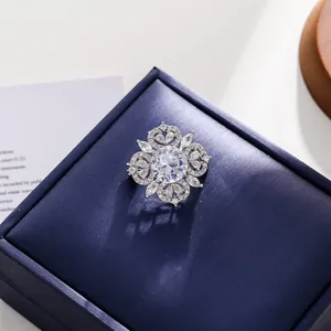 Close-up of a vintage palace style hollow brooch with sparkling crystal stones