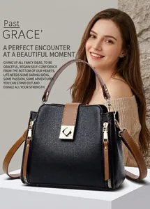 Elegante bolso de piel negra y marrón con correa ajustable y finos acabados en oro