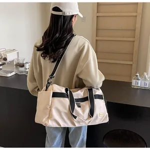 Large beige oxford cloth travel tote bag for women commuting with adjustable straps