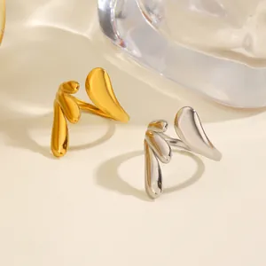 Anillos abiertos de acero inoxidable con diseño de gotas de agua en acabados oro y plata
