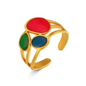 Anillo vintage de acero inoxidable dorado con esmalte ovalado rojo verde y azul