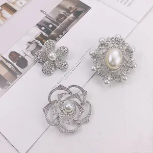 Elegant silver-tone brooch set with faux pearls and rhinestones in flower and rose designs
