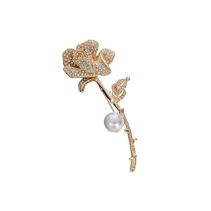 Elegant rose brooch for women with sparkling rhinestones and a large white pearl