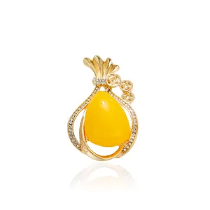 Elegant Alloy Lucky Bag Brooch For Women Gold Rhinestone Yellow Synthetic Resin Drop Pendant Exquisite Fashion Pin Brooch For Coat