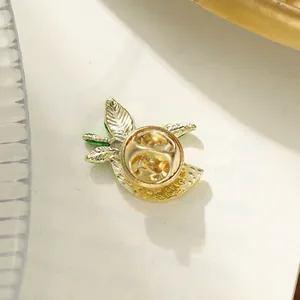 Elegant gold watermelon fruit brooch pin accessory with secure butterfly clutch