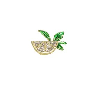 Elegant sparkling rhinestone lemon slice brooch with green enamel leaves for women's clothing