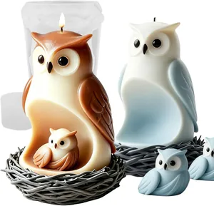 Close-up detail of finished owl candles in nests with a translucent silicone mold