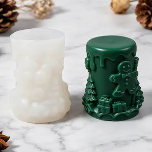 Christmas gingerbread man and tree silicone candle mold with finished green candle