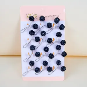 Set of black glitter ball U-shaped pins for scarves and hijabs on display card