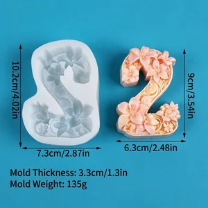 Detail view of floral number 2 silicone mold showing dimensions and finished candle.
