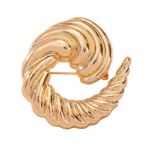 Eleganter goldfarbener Spiralbrosche aus Legierung für hochwertige Damenanzüge und Mäntel