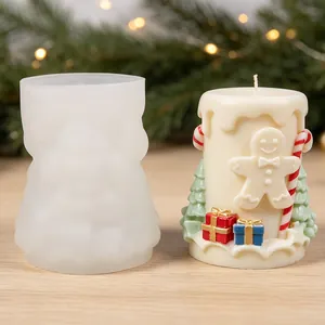 Detail view of cylindrical Christmas gingerbread man candle with its silicone mold
