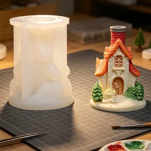 Detailed silicone mold for Christmas house resin craft with a finished micro-landscape
