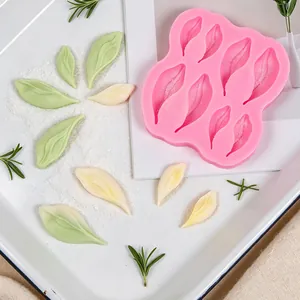 Pink silicone mold for realistic falling flower petals with delicate sugar craft details