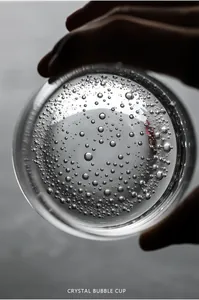 Macro view of crystal whiskey glass showcasing elegant and unique air bubble textures