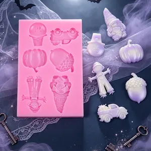 Detail showing pink silicone mold with autumn theme shapes and pearlescent finished casts