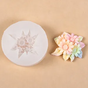 Detailed macro view of a sunflower bouquet silicone mold and its colorful resin casting.