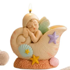 Candela artigianale angioletto fata che dorme in conchiglia come regalo decorativo