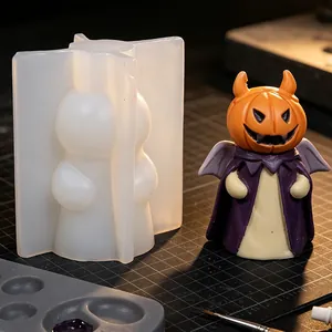 Detail view of a Halloween pumpkin devil candle silicone mold showing the finished figure
