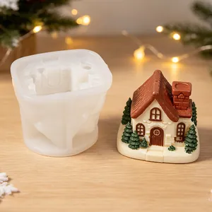 Detailed macro view showing white silicone house mold and its colorful finished plaster result