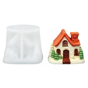 Detailed view of the silicone mold alongside its finished colorful miniature house product