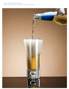 Close-up detail of a premium crystal beer mug with a turquoise stone in the base