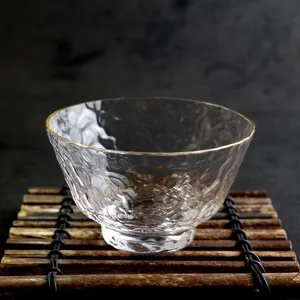 Elegant hand-blown hammered glass tea cup with gold rim for Kung Fu tea and home use