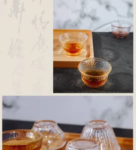 Detailed close-up view showing the hammered texture of Japanese glass tea cups.