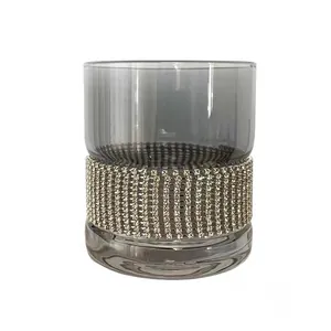 Luxury smoked grey whiskey glass with sparkling rhinestone encrusted band decoration.