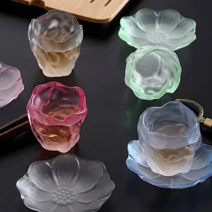 Artistic Japanese smoky colorful glass tea cups with frosted flower-shaped saucers set